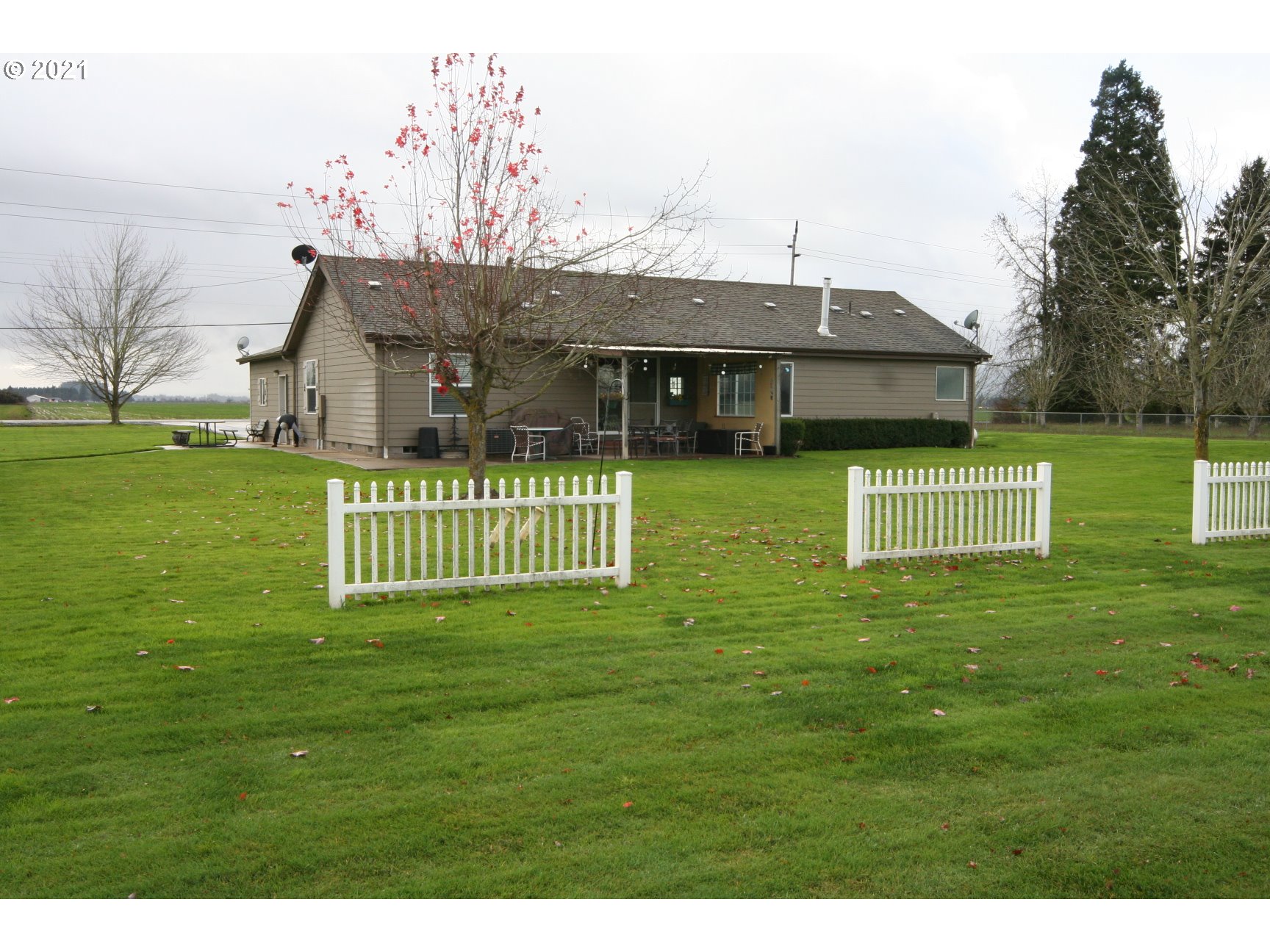 16775 Southeast Fairview Road Dayton, OR 97114 - Photo 22 of 24 a front view of a house with a garden