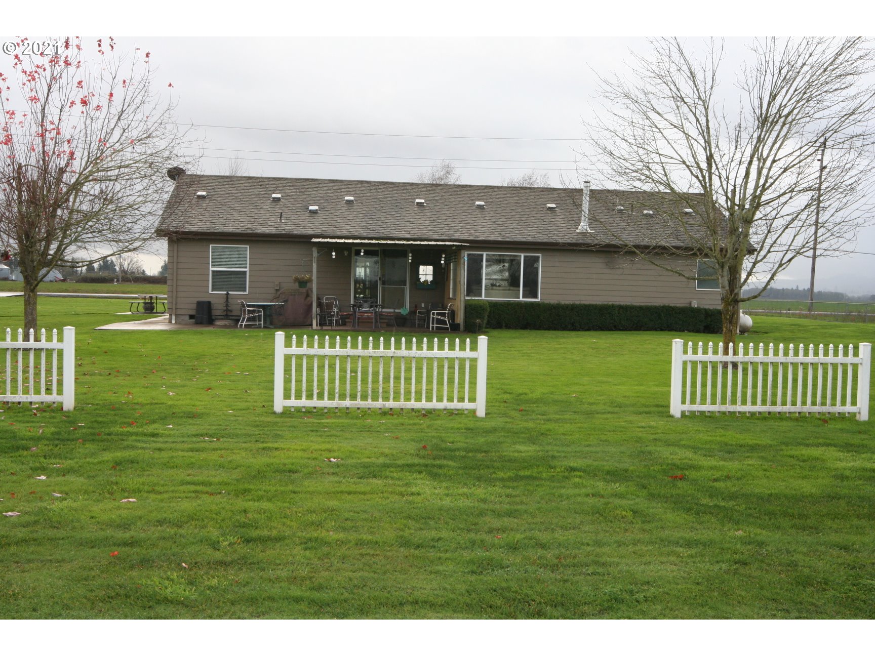 16775 Southeast Fairview Road Dayton, OR 97114 - Photo 23 of 24 a front view of a house with a garden