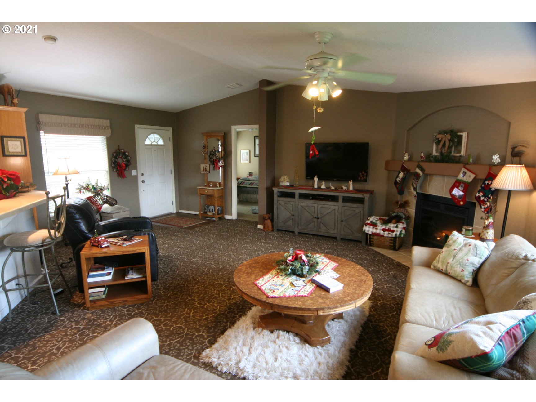 16775 Southeast Fairview Road Dayton, OR 97114 - Photo 9 of 24 a living room with furniture and a flat screen tv