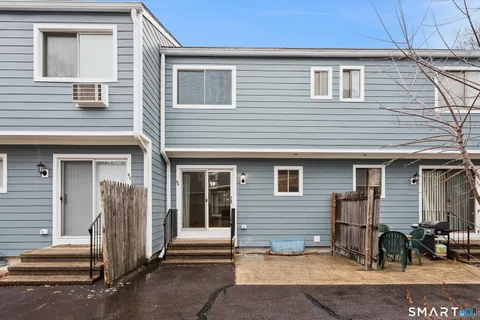 a view of a house with patio