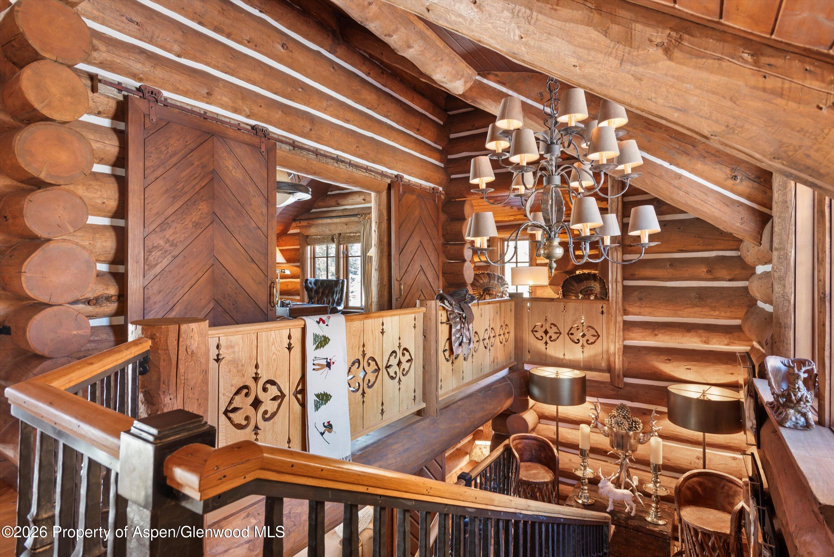 6855 Capitol Creek Road Snowmass, CO 81654 - Photo 23 of 79 front view of a building with stairs