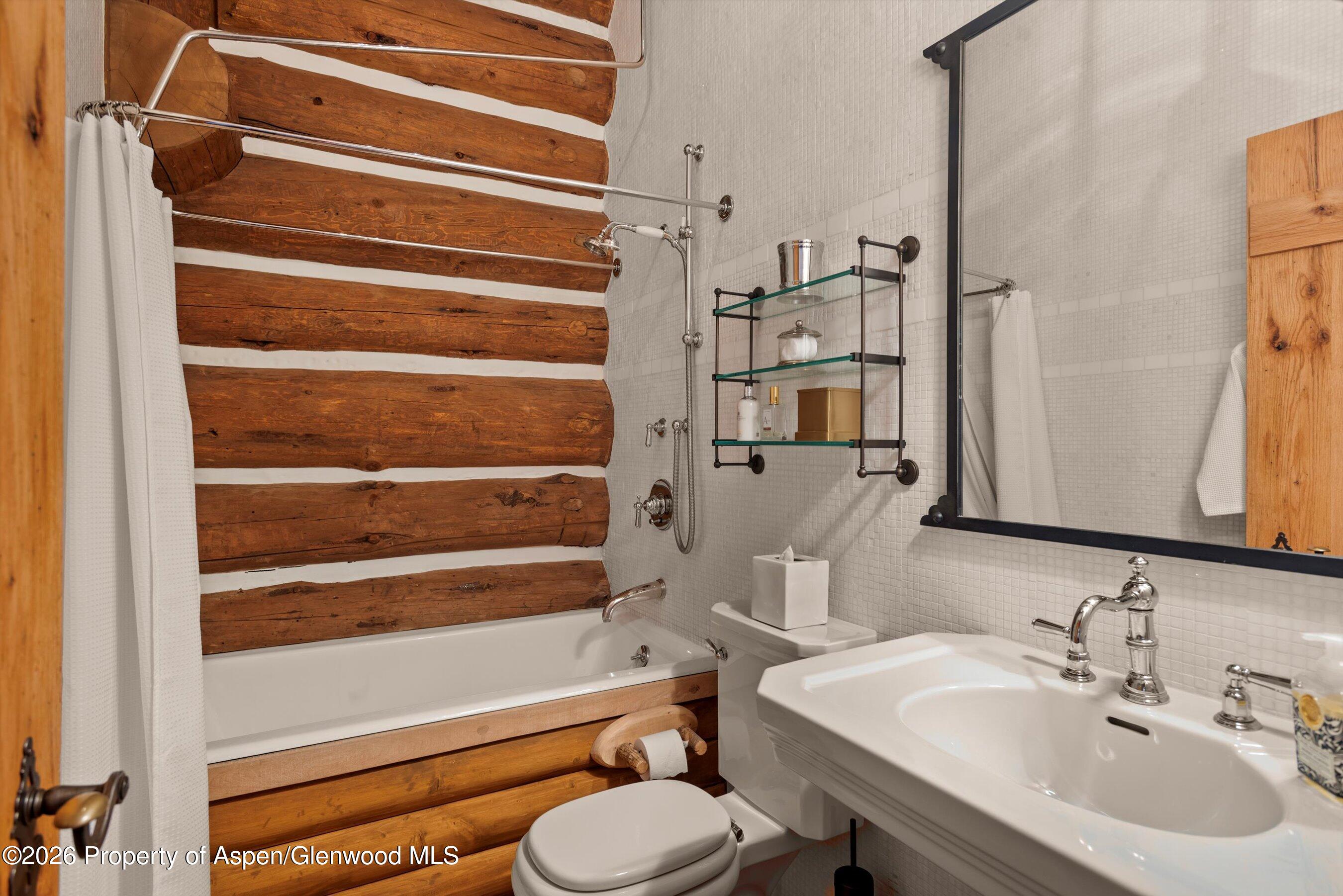 6855 Capitol Creek Road Snowmass, CO 81654 - Photo 36 of 79 a bathroom with a sink toilet and shower