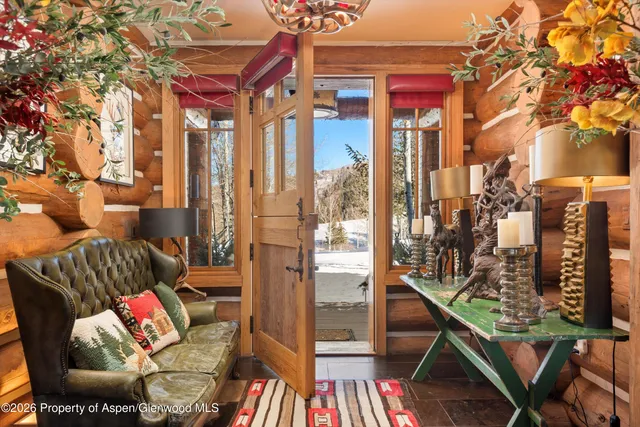 a view of a chairs and table in a patio