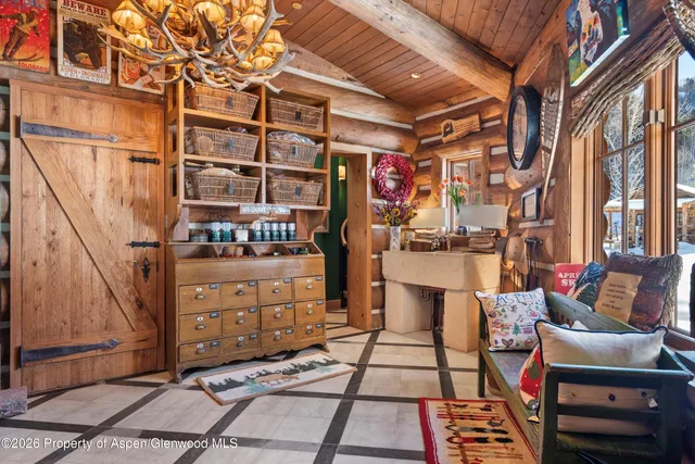 a view of a lush green hillside and mountains