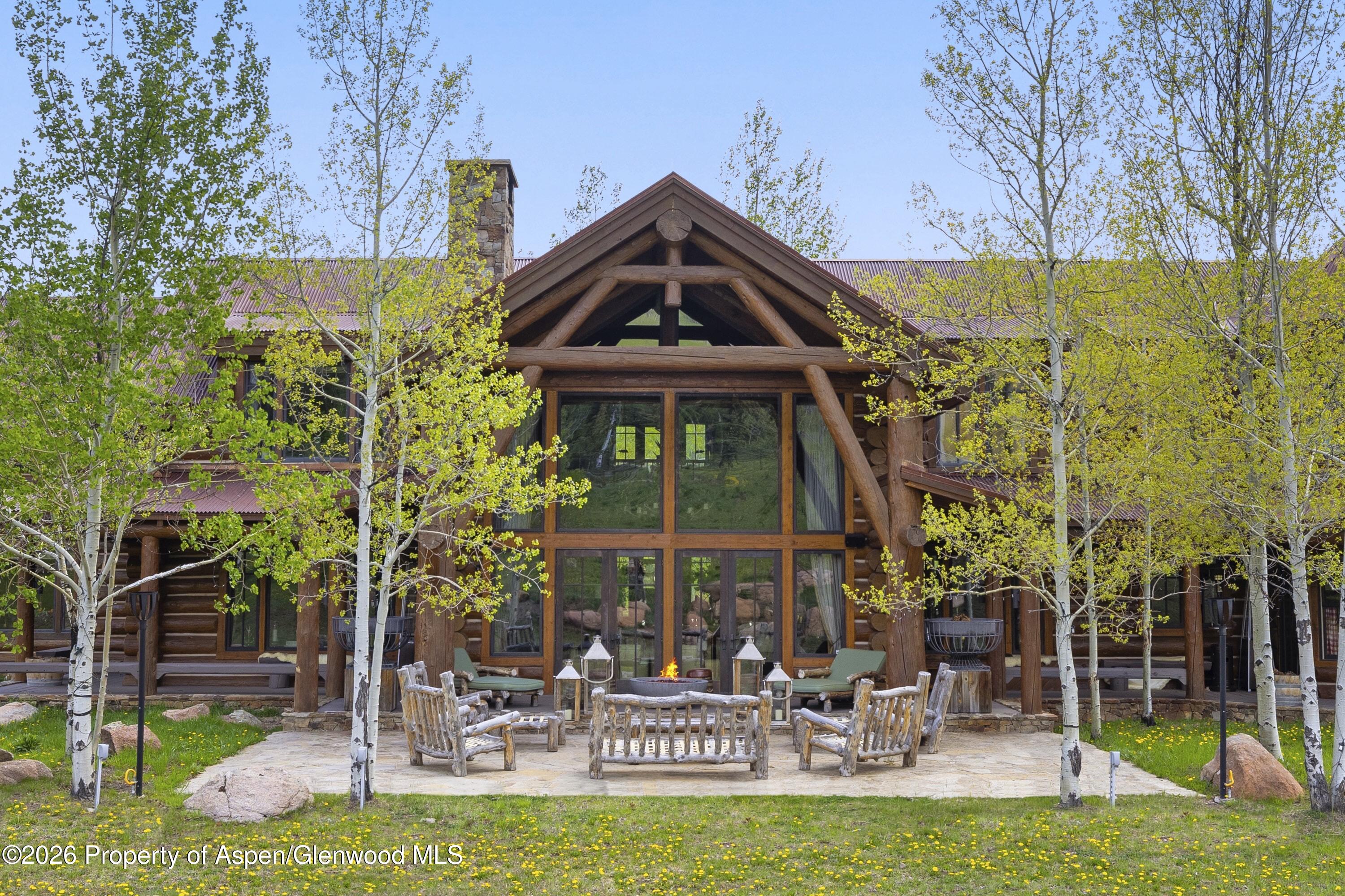 6855 Capitol Creek Road Snowmass, CO 81654 - Photo 65 of 79 Summer back of house