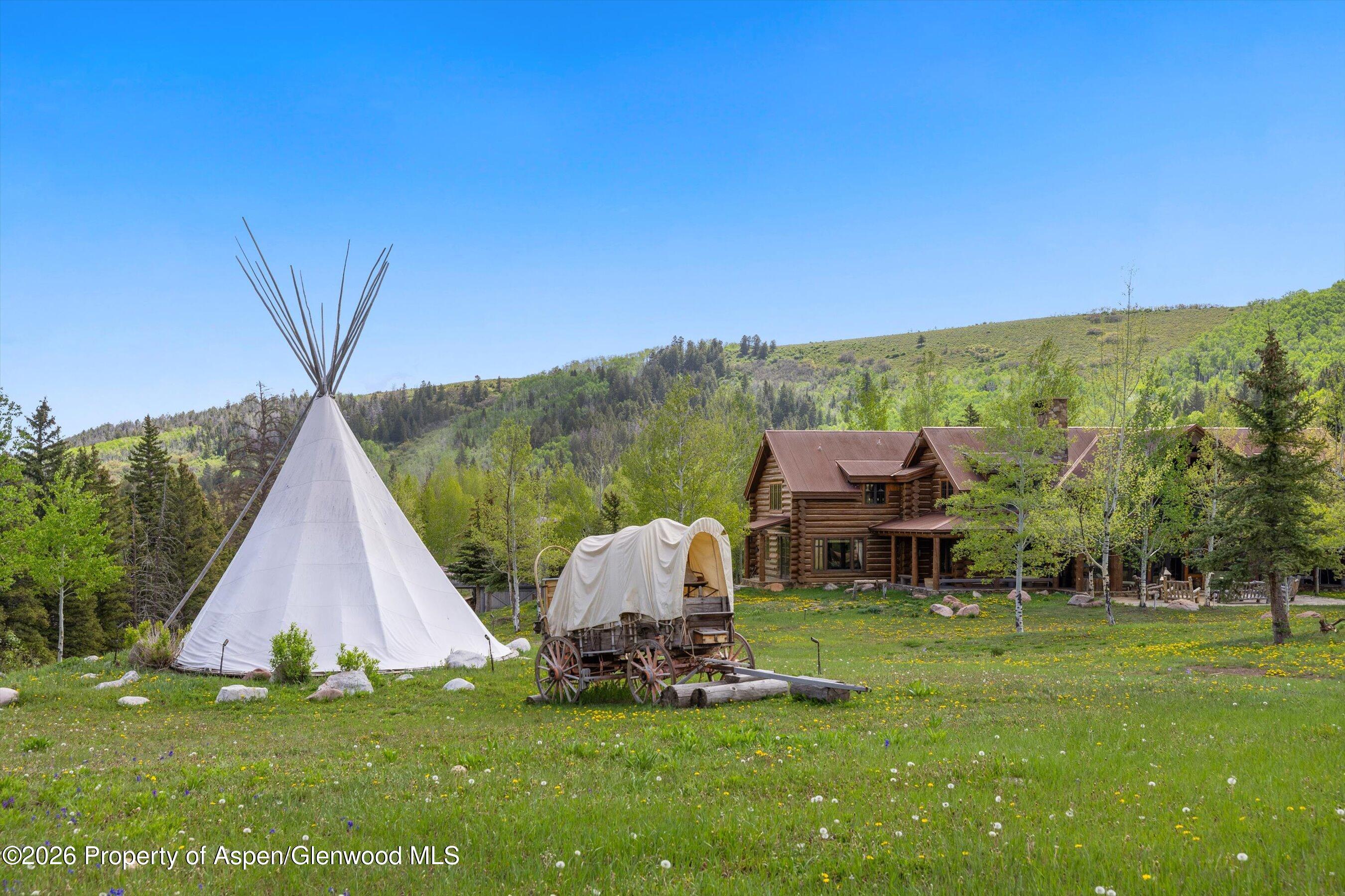 6855 Capitol Creek Road Snowmass, CO 81654 - Photo 69 of 79 a view of house with backyard