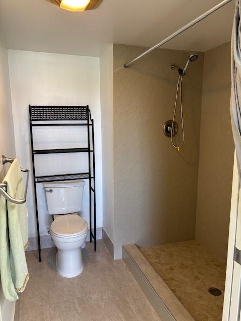 12651 Southwest 16th Court, Unit 413B Pembroke Pines, FL 33027 - Photo 23 of 66 a bathroom with a toilet and a shower