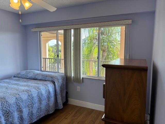 12651 Southwest 16th Court, Unit 413B Pembroke Pines, FL 33027 - Photo 27 of 66 a bedroom with a bed and a window