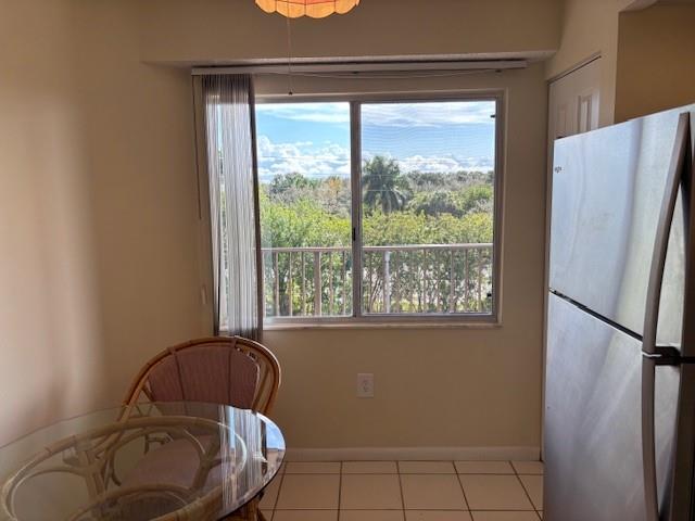 12651 Southwest 16th Court, Unit 413B Pembroke Pines, FL 33027 - Photo 42 of 66 a room with a bed and a window