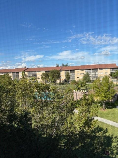 12651 Southwest 16th Court, Unit 413B Pembroke Pines, FL 33027 - Photo 65 of 66 a view of a yard