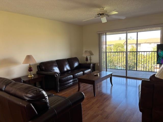 12651 Southwest 16th Court, Unit 413B Pembroke Pines, FL 33027 - Photo 8 of 66 a living room with furniture and a window