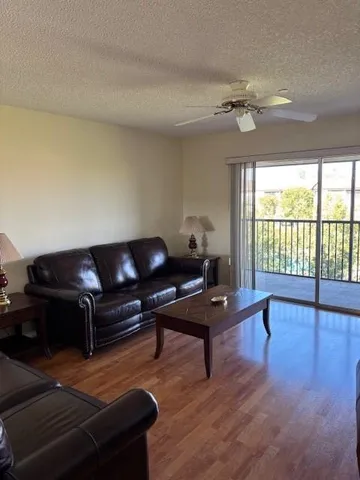 a living room with a couch and a table