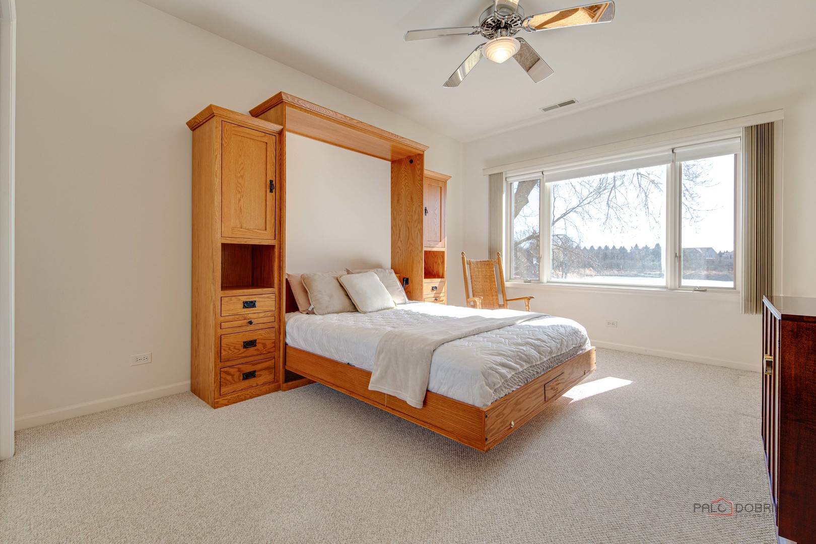 209 Rivershire Lane, Unit 203 Lincolnshire, IL 60069 - Photo 36 of 50 a bedroom with a bed and a window