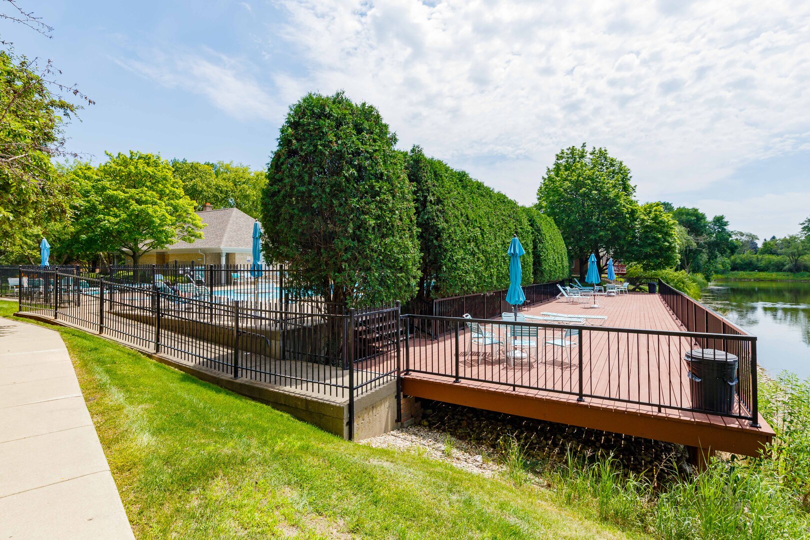 209 Rivershire Lane, Unit 203 Lincolnshire, IL 60069 - Photo 40 of 50 a view of a backyard with swimming pool