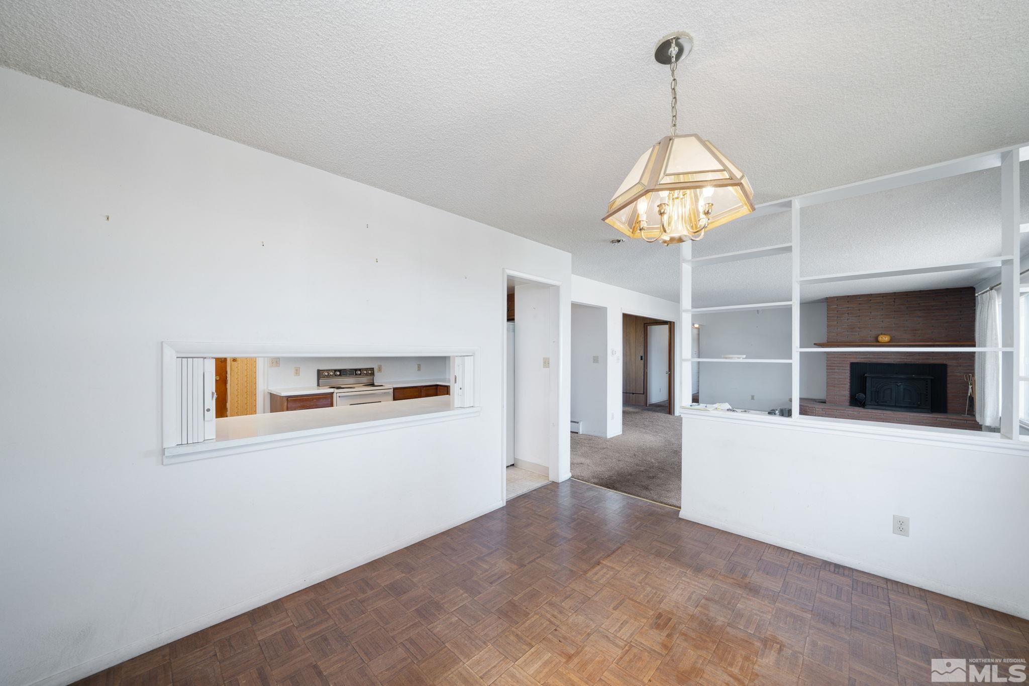 3470 Lodestar Lane Reno, NV 89503 - Photo 8 of 28 a view of a livingroom with a chandelier