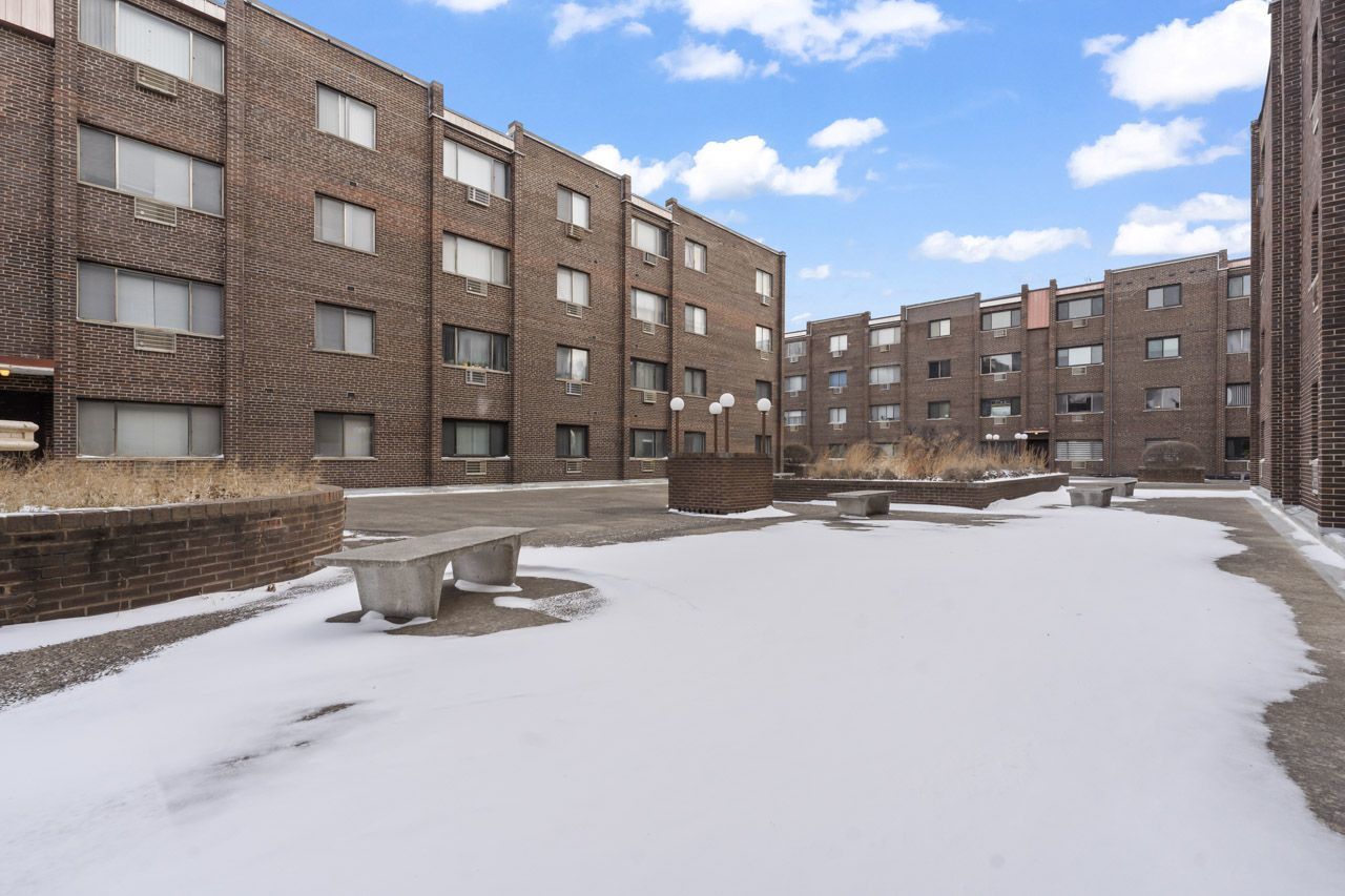 4623 North Chester Avenue, Unit 206 Chicago, IL 60656 - Photo 18 of 19 a view of a building with snow on the road
