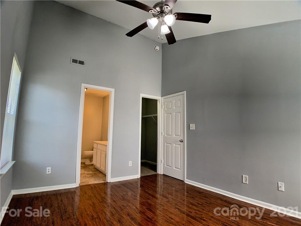 1524 Capps Hill Mine Road Charlotte, NC 28216 - Photo 21 of 32 wooden floor in an empty room