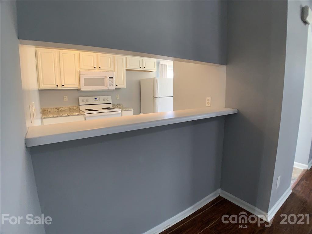 1524 Capps Hill Mine Road Charlotte, NC 28216 - Photo 10 of 32 a view of an empty room with a window