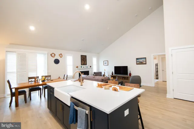 a view of a living room and dining room
