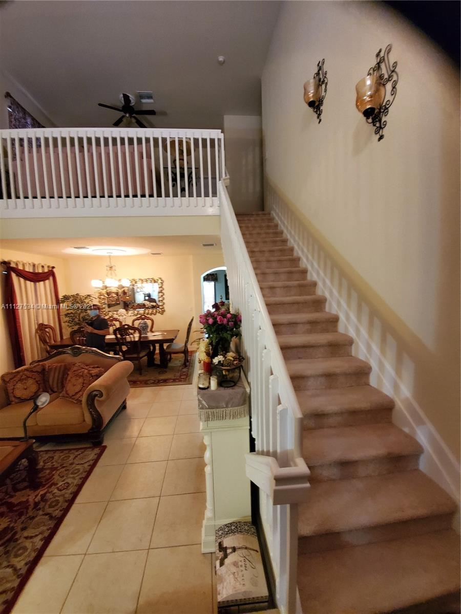 24075 Southwest 113 Passage Homestead, FL 33032 - Photo 18 of 35 a view of entryway and hall