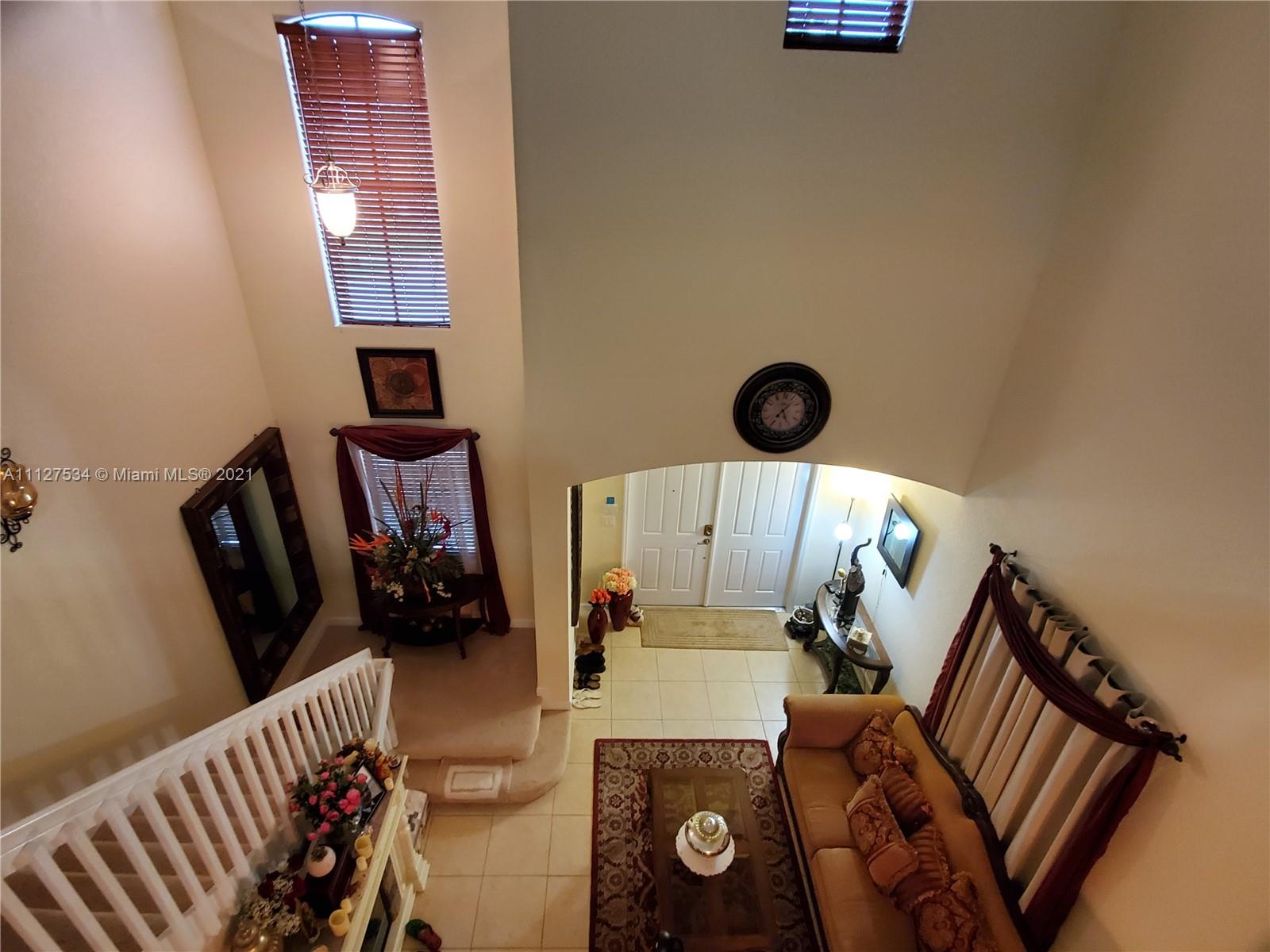 24075 Southwest 113 Passage Homestead, FL 33032 - Photo 21 of 35 a view of livingroom with washer and dryer