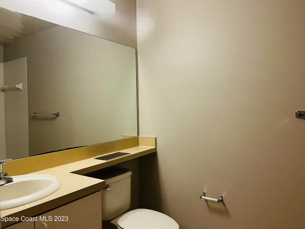a bathroom with a sink a toilet