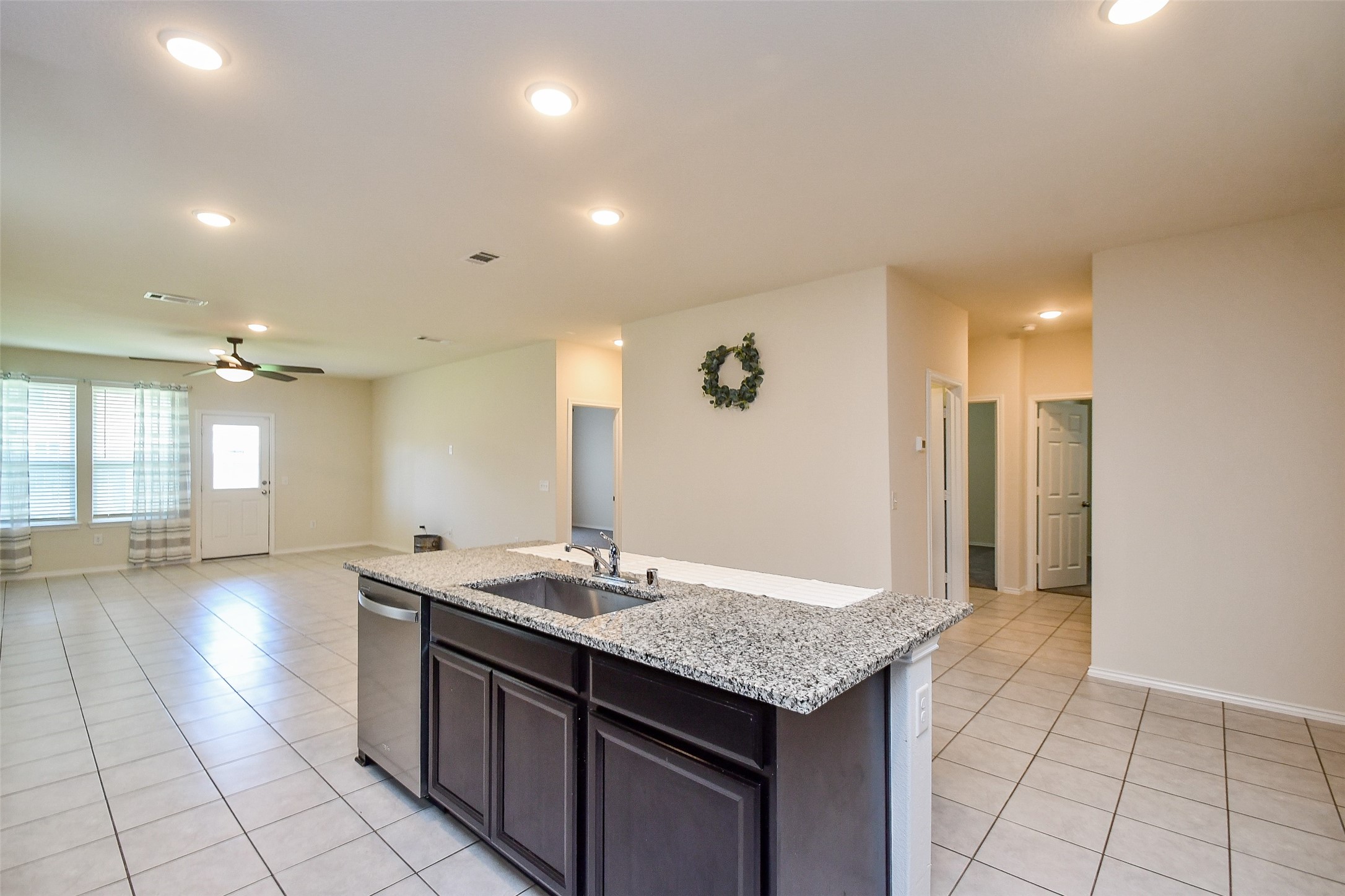 25918 Rustical Road Katy, TX 77493 - Photo 14 of 26 a bathroom with a granite countertop sink and a mirror