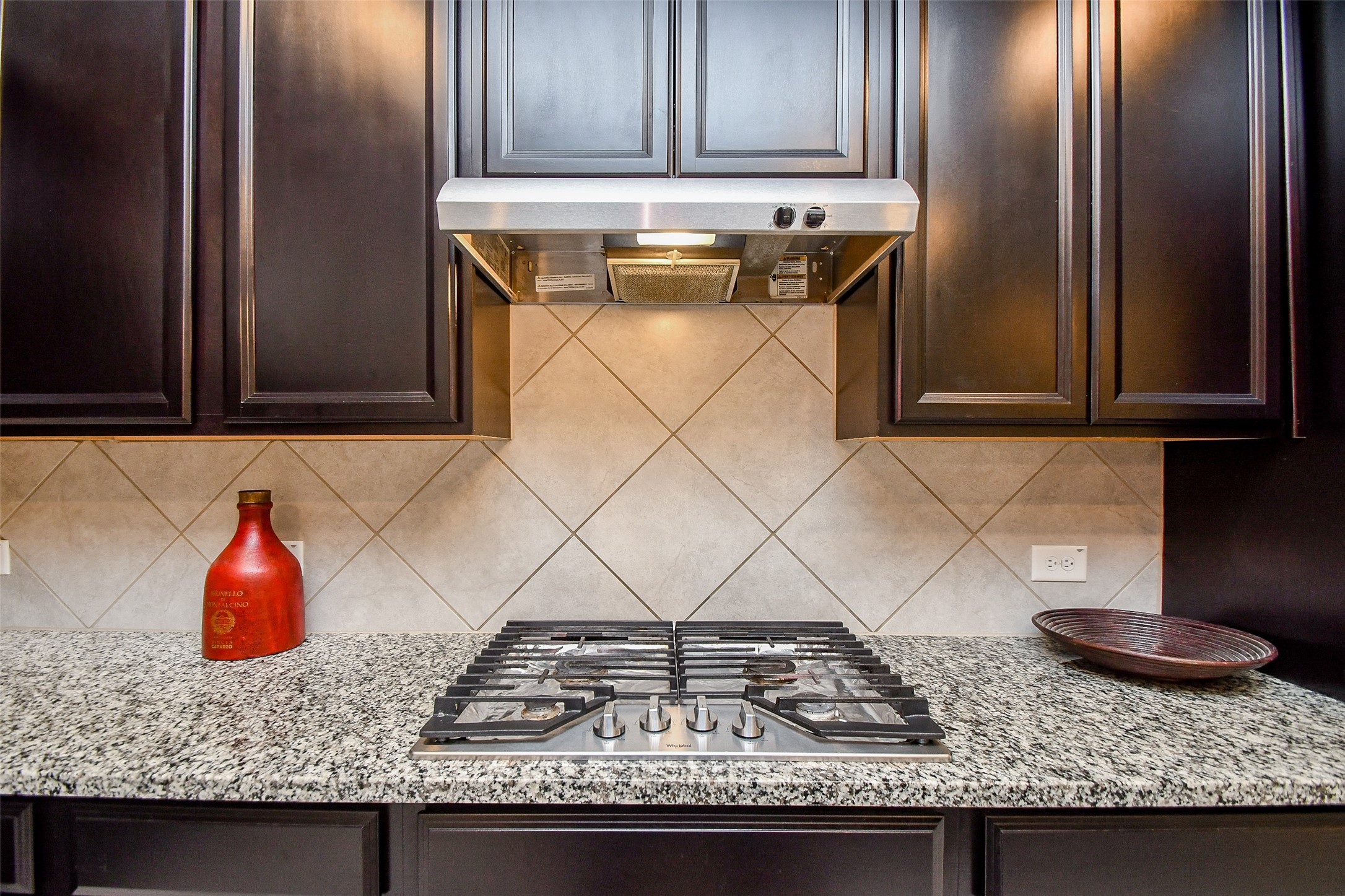 25918 Rustical Road Katy, TX 77493 - Photo 15 of 26 a kitchen with granite countertop a sink and a stove