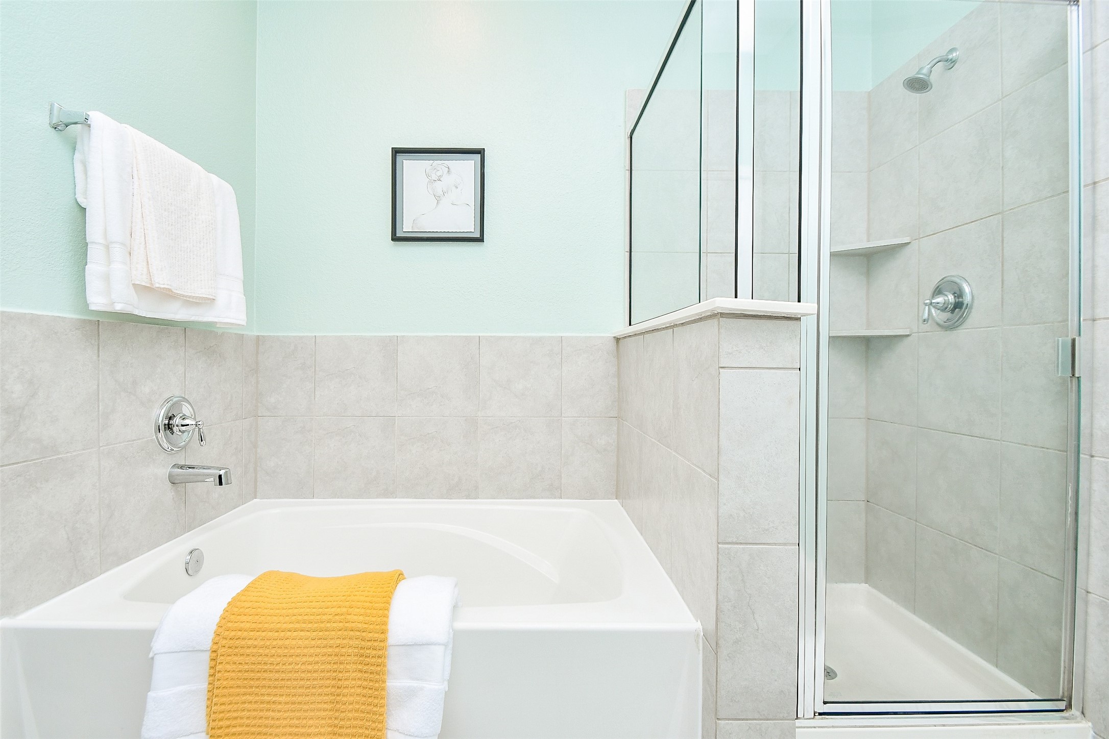 25918 Rustical Road Katy, TX 77493 - Photo 21 of 26 a bathroom with a tub and shower