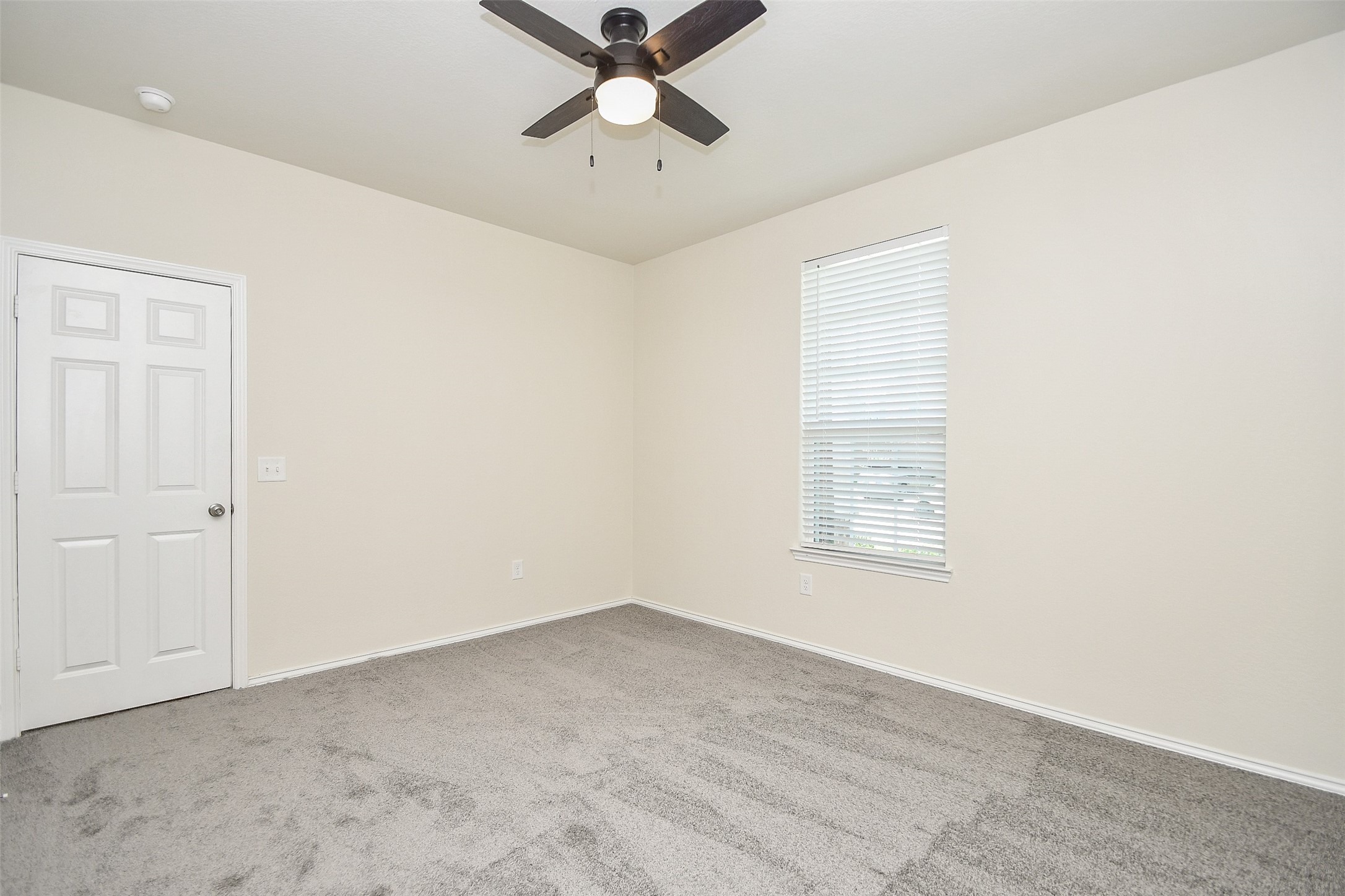 25918 Rustical Road Katy, TX 77493 - Photo 4 of 26 a view of an empty room with a window