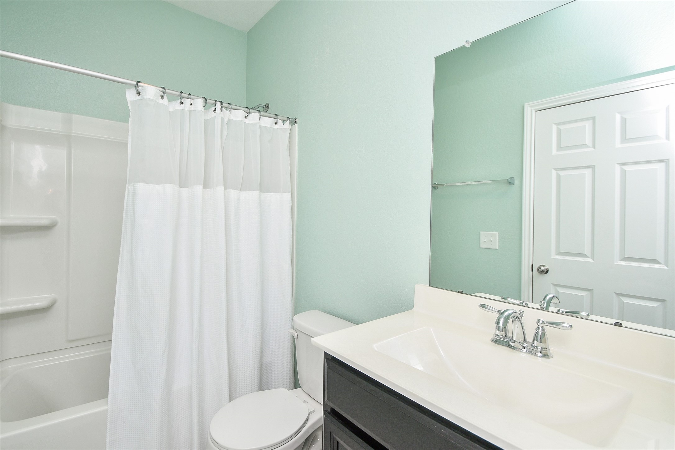 25918 Rustical Road Katy, TX 77493 - Photo 6 of 26 a bathroom with a sink toilet and shower