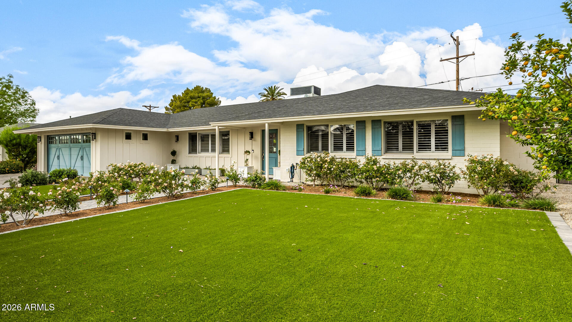 4010 East Coolidge Street Phoenix, AZ 85018 - Photo 14 of 82 a front view of house with yard and green space