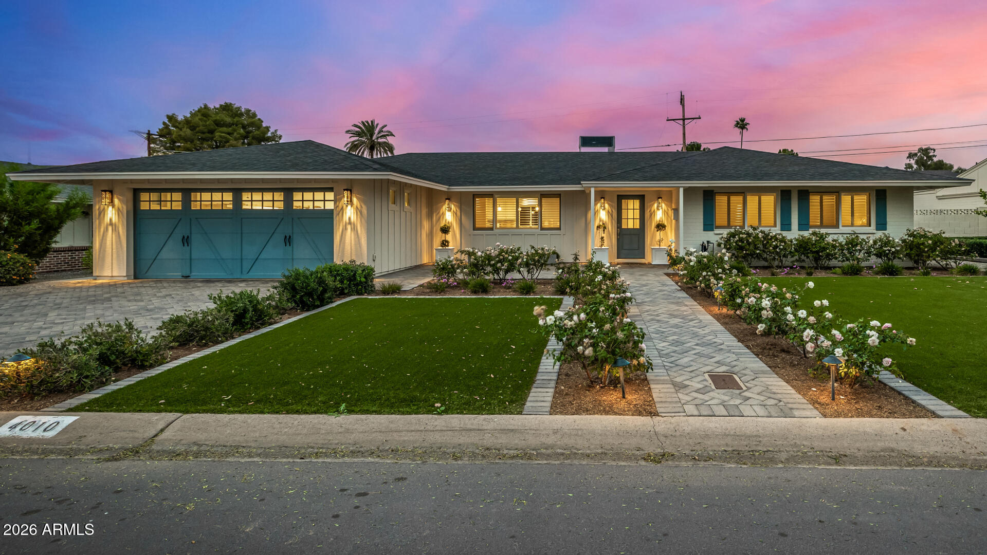 4010 East Coolidge Street Phoenix, AZ 85018 - Photo 2 of 82 a front view of a house with a yard
