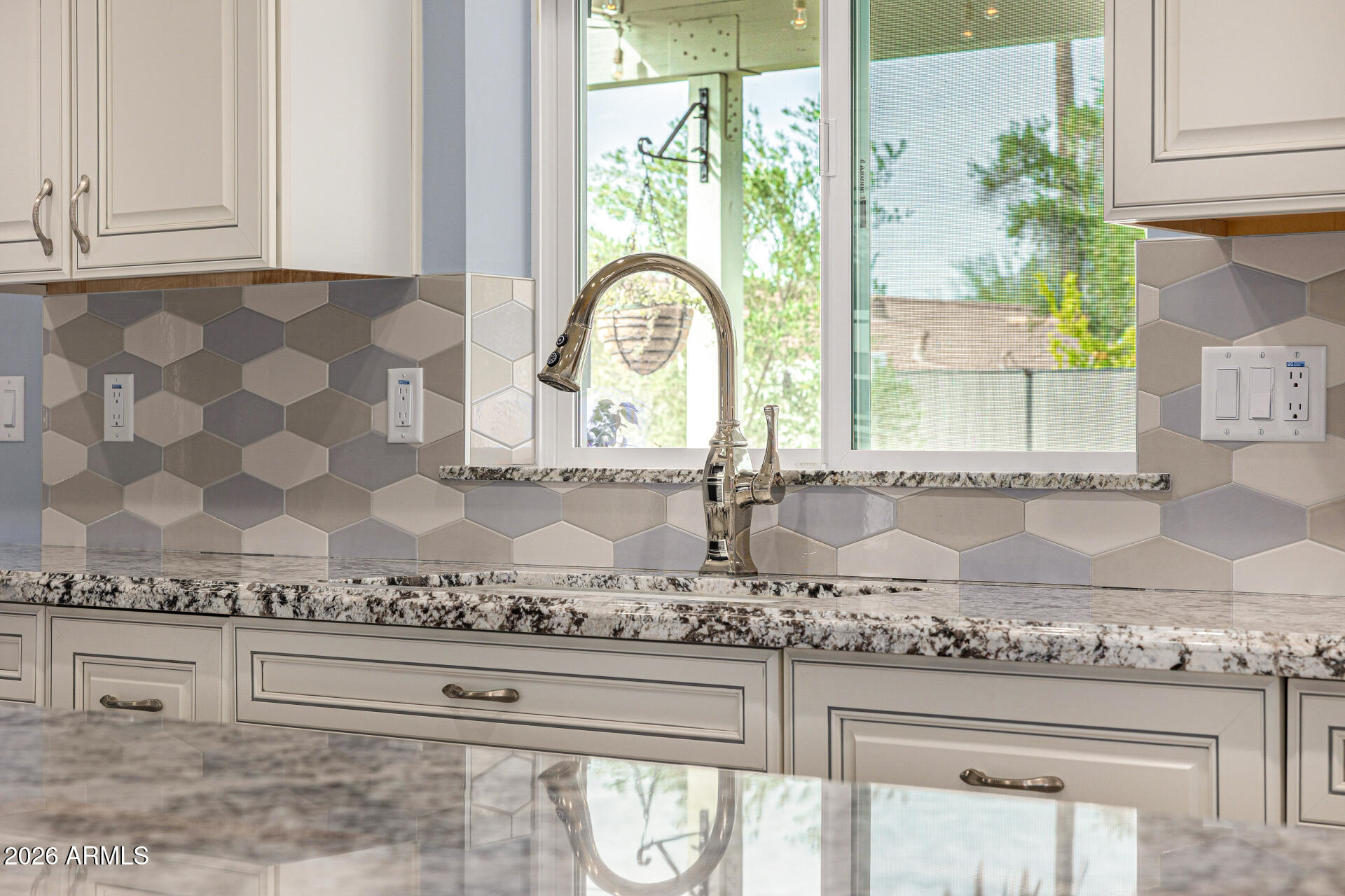 4010 East Coolidge Street Phoenix, AZ 85018 - Photo 30 of 82 a bathroom with a granite countertop sink and a window