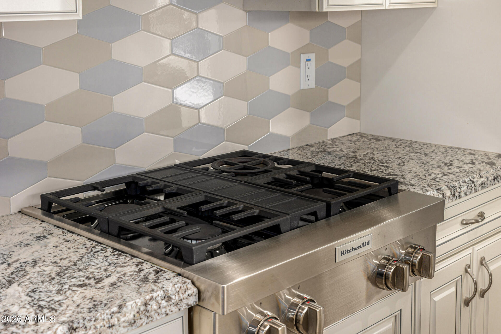 4010 East Coolidge Street Phoenix, AZ 85018 - Photo 31 of 82 a close up of a stove sitting inside of a kitchen