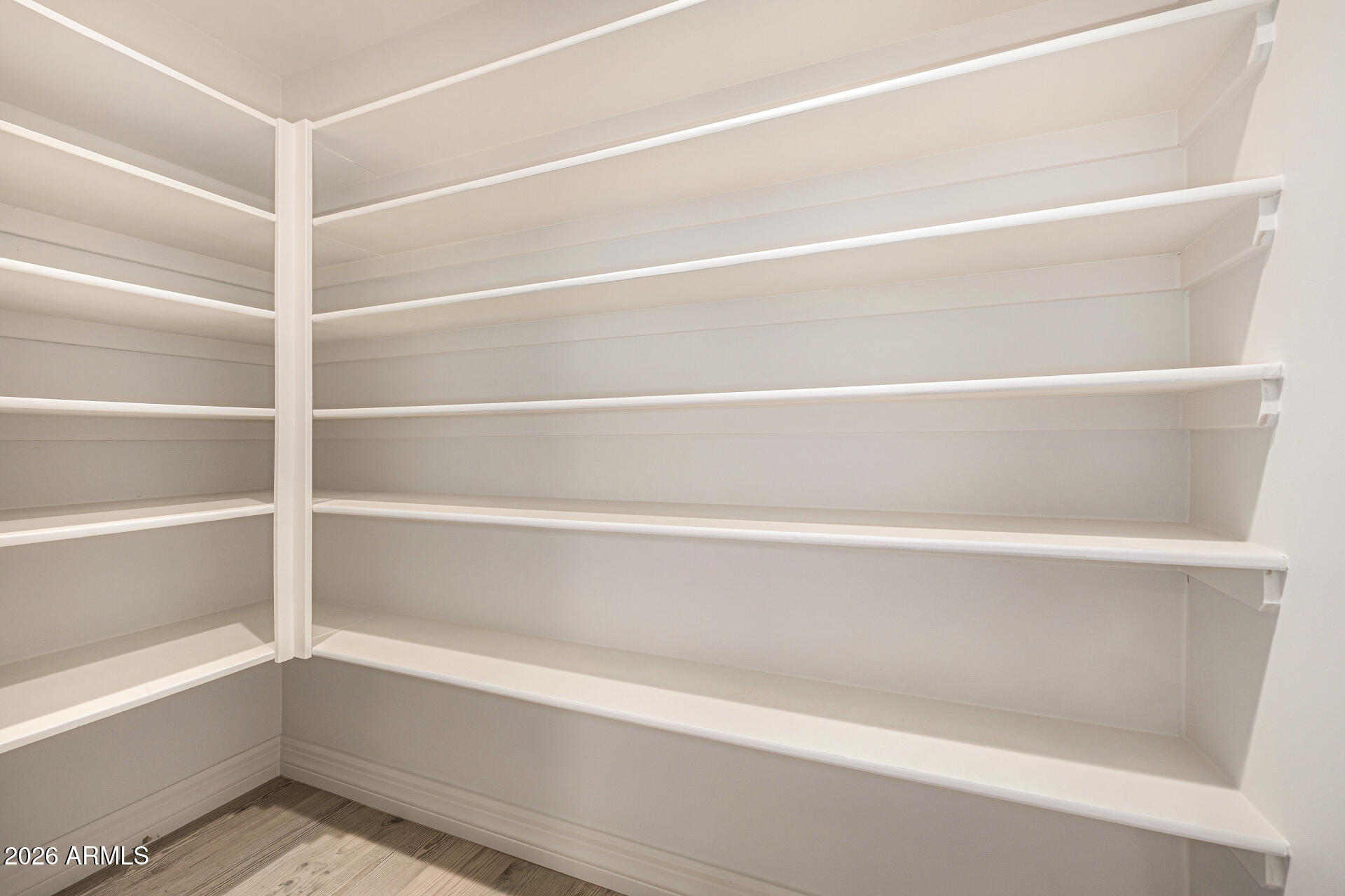 4010 East Coolidge Street Phoenix, AZ 85018 - Photo 34 of 82 a view of a closet with wooden floor