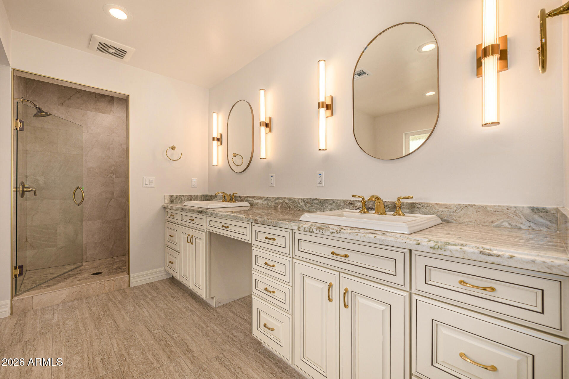 4010 East Coolidge Street Phoenix, AZ 85018 - Photo 39 of 82 a spacious bathroom with a granite countertop sink a mirror and a shower