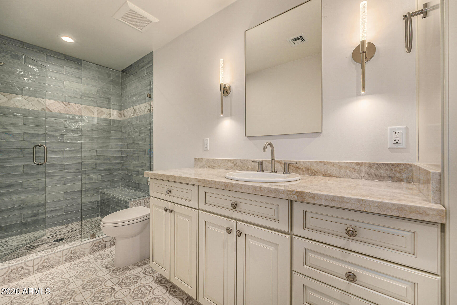4010 East Coolidge Street Phoenix, AZ 85018 - Photo 47 of 82 a bathroom with a granite countertop sink a toilet and a shower