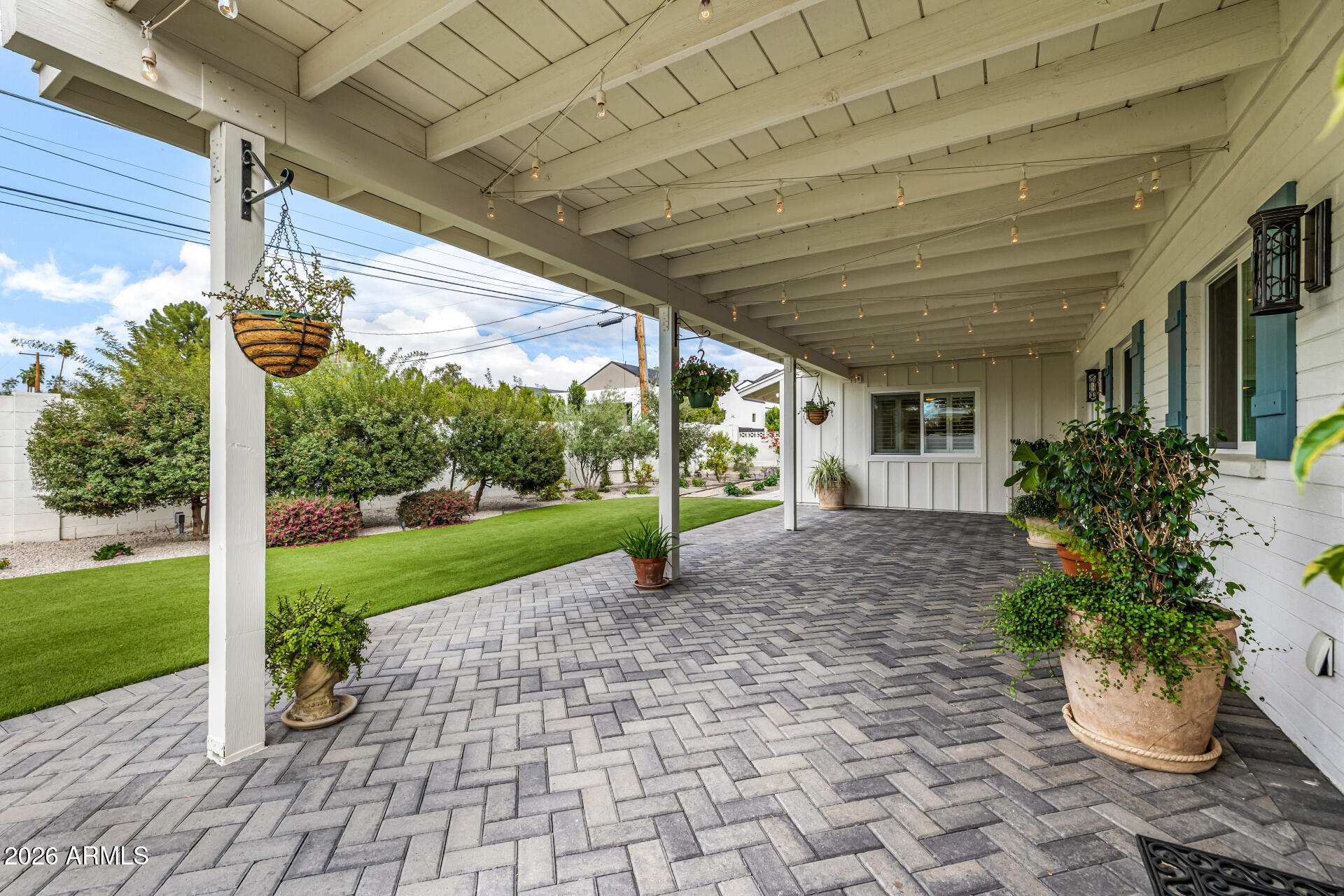 4010 East Coolidge Street Phoenix, AZ 85018 - Photo 68 of 82 a view of a porch with garden and plants