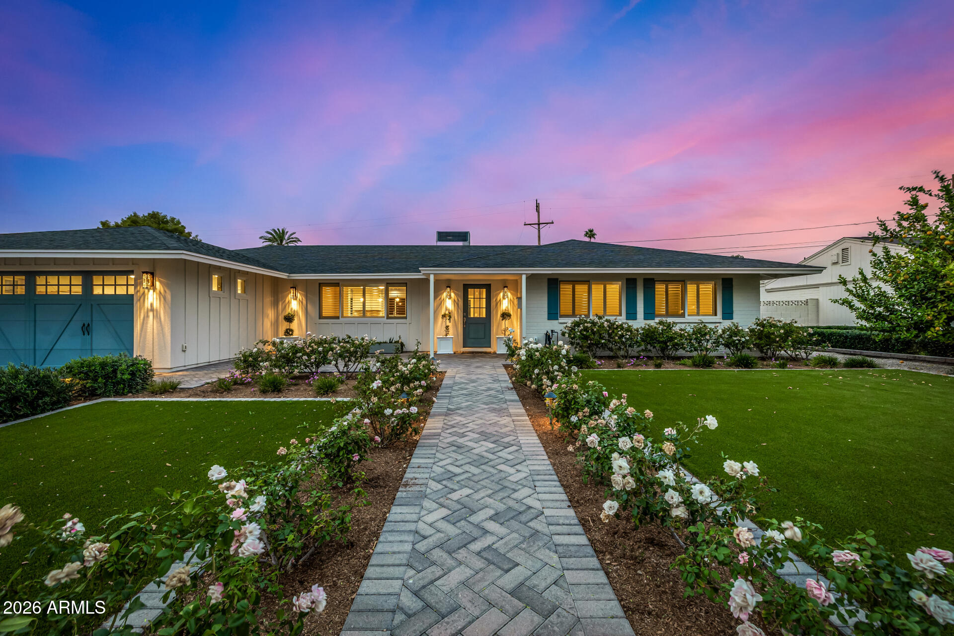 4010 East Coolidge Street Phoenix, AZ 85018 - Photo 7 of 82 a front view of a house with garden