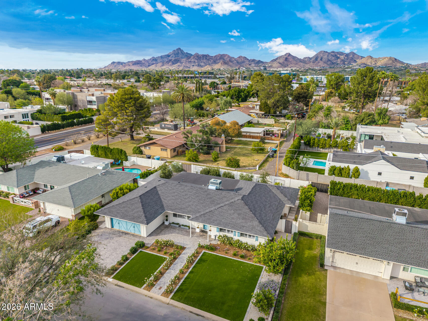 4010 East Coolidge Street Phoenix, AZ 85018 - Photo 80 of 82 an aerial view of residential houses with outdoor space