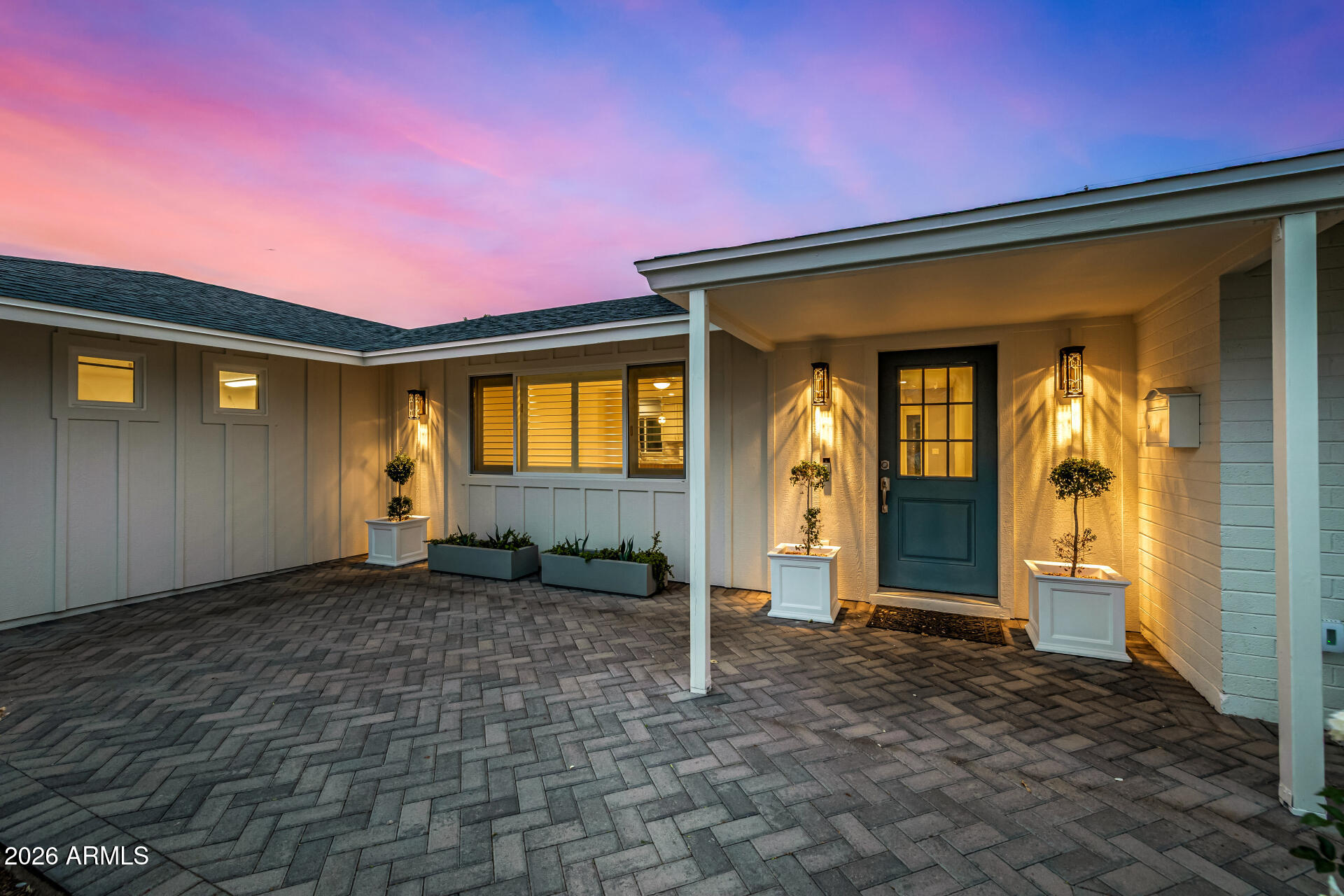 4010 East Coolidge Street Phoenix, AZ 85018 - Photo 8 of 82 a front view of a house