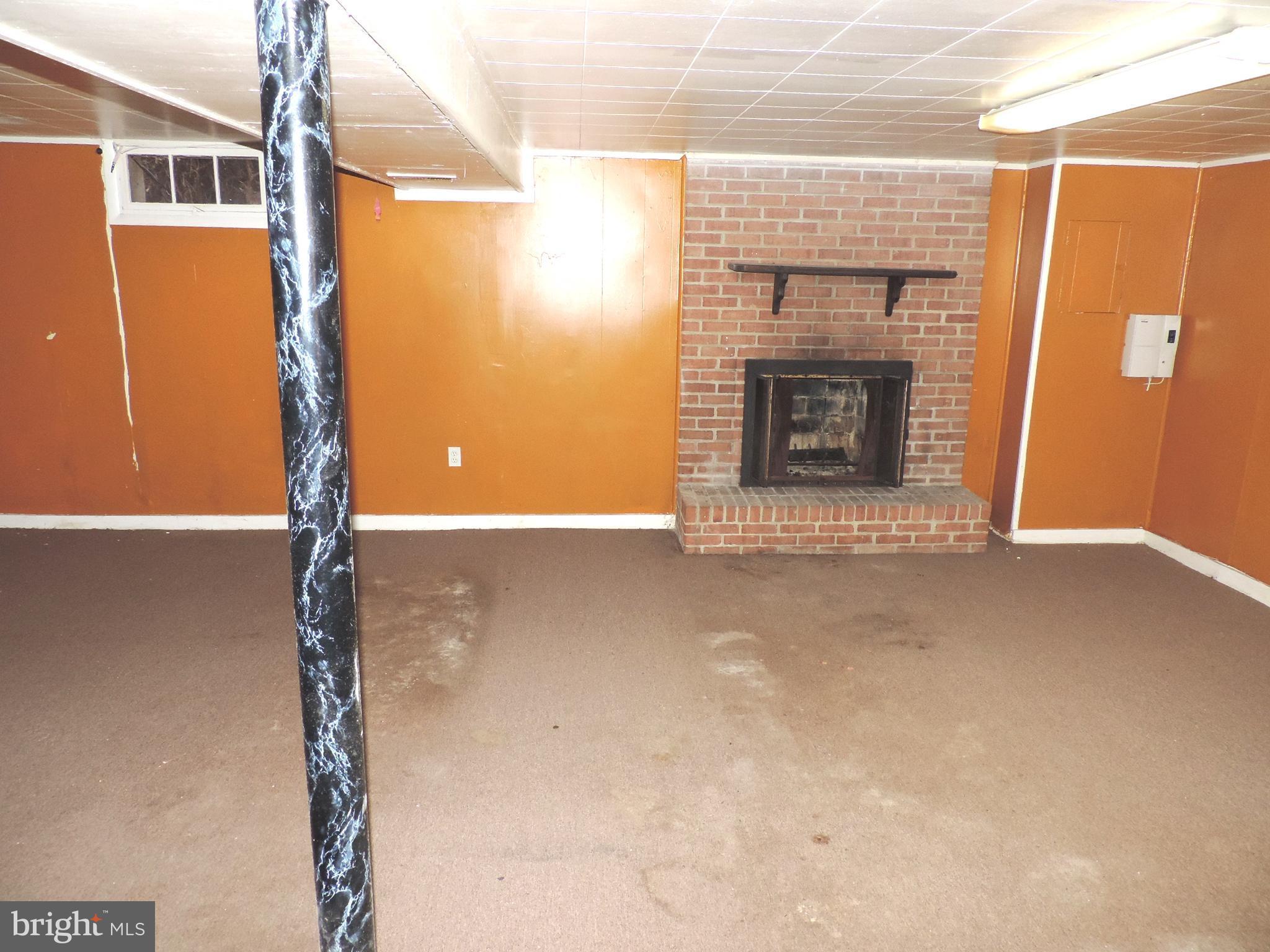 3742 Trent Road Randallstown, MD 21133 - Photo 12 of 18 LL Family Room & Fireplace
