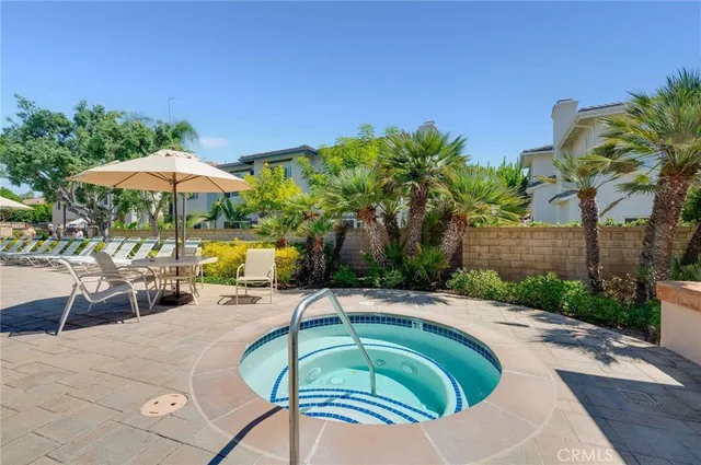 a picture of a bench in front of a wall