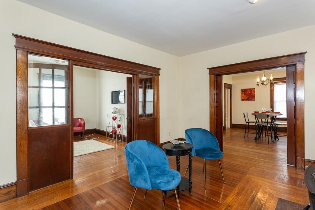 40 Powell Avenue Springfield, MA 01118 - Photo 6 of 35 a living room with furniture and a large window