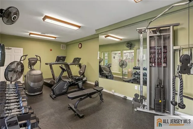 a view of a swimming pool with a yard