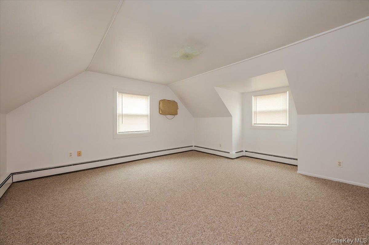 1674 Kroll Road East Meadow, NY 11554 - Photo 14 of 25 an empty room with a window
