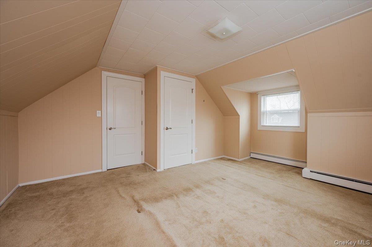 1674 Kroll Road East Meadow, NY 11554 - Photo 15 of 25 an empty room with windows