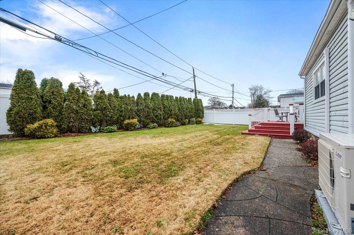 1674 Kroll Road East Meadow, NY 11554 - Photo 21 of 25 a view of a backyard