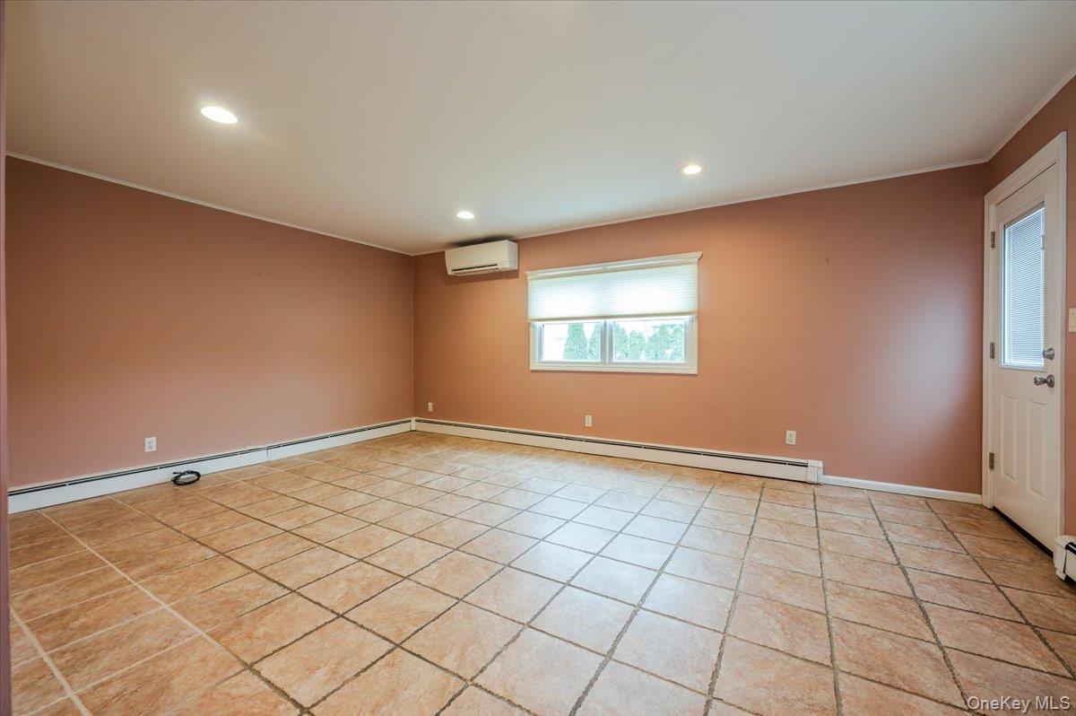 1674 Kroll Road East Meadow, NY 11554 - Photo 10 of 25 a view of an empty room and a window